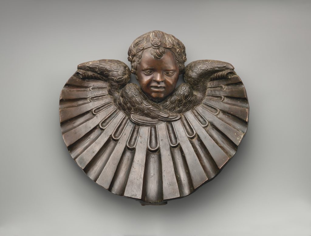 Cherub and shell