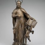 Saint Ignatius Loyola with an angel holding a book